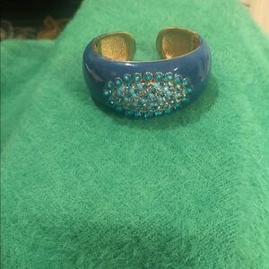 Turquoise Crystal Hinged Enamel with Lighter and Darker Stones. Very versatile.